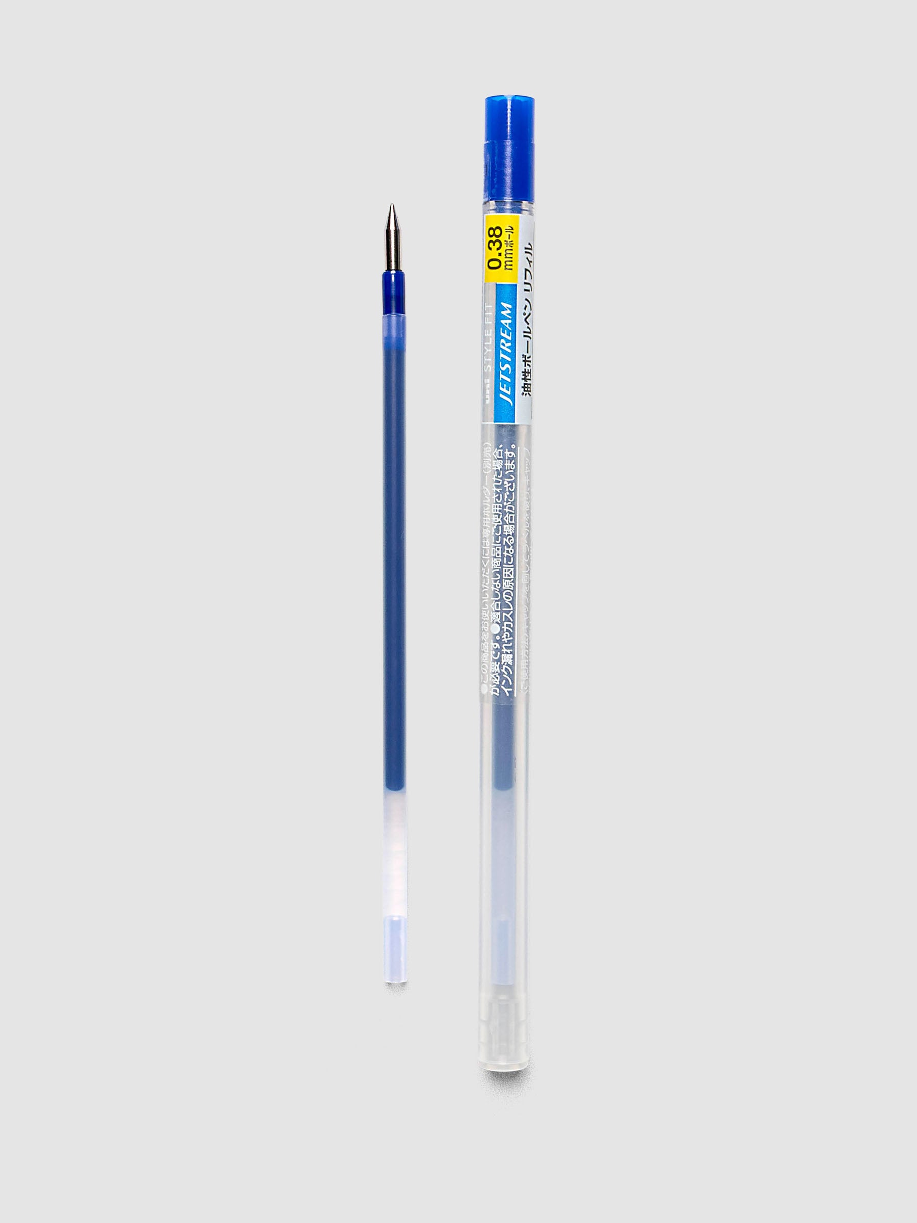 Uni-ball SXR-89-38 Style Fit Jetstream Pen Refill in blue shown next to packaged tube with printed label