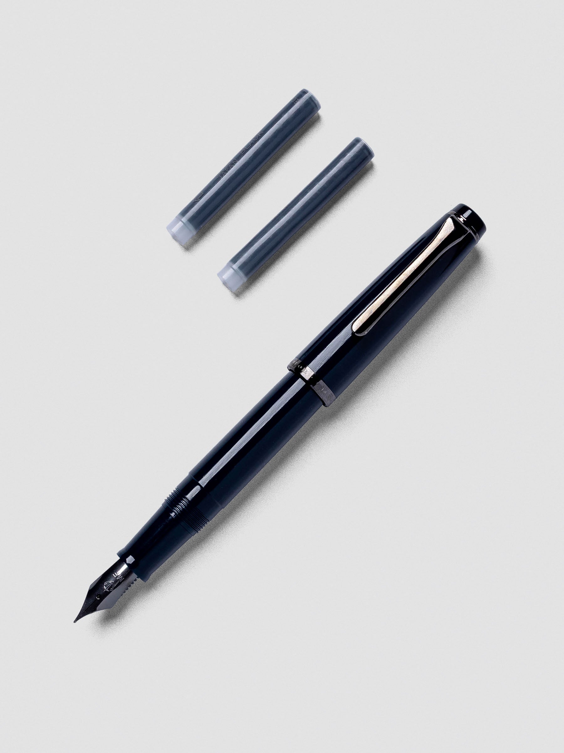Close-up of Sailor Recle Fountain Pen Medium in Iron Blue highlighting nib section.