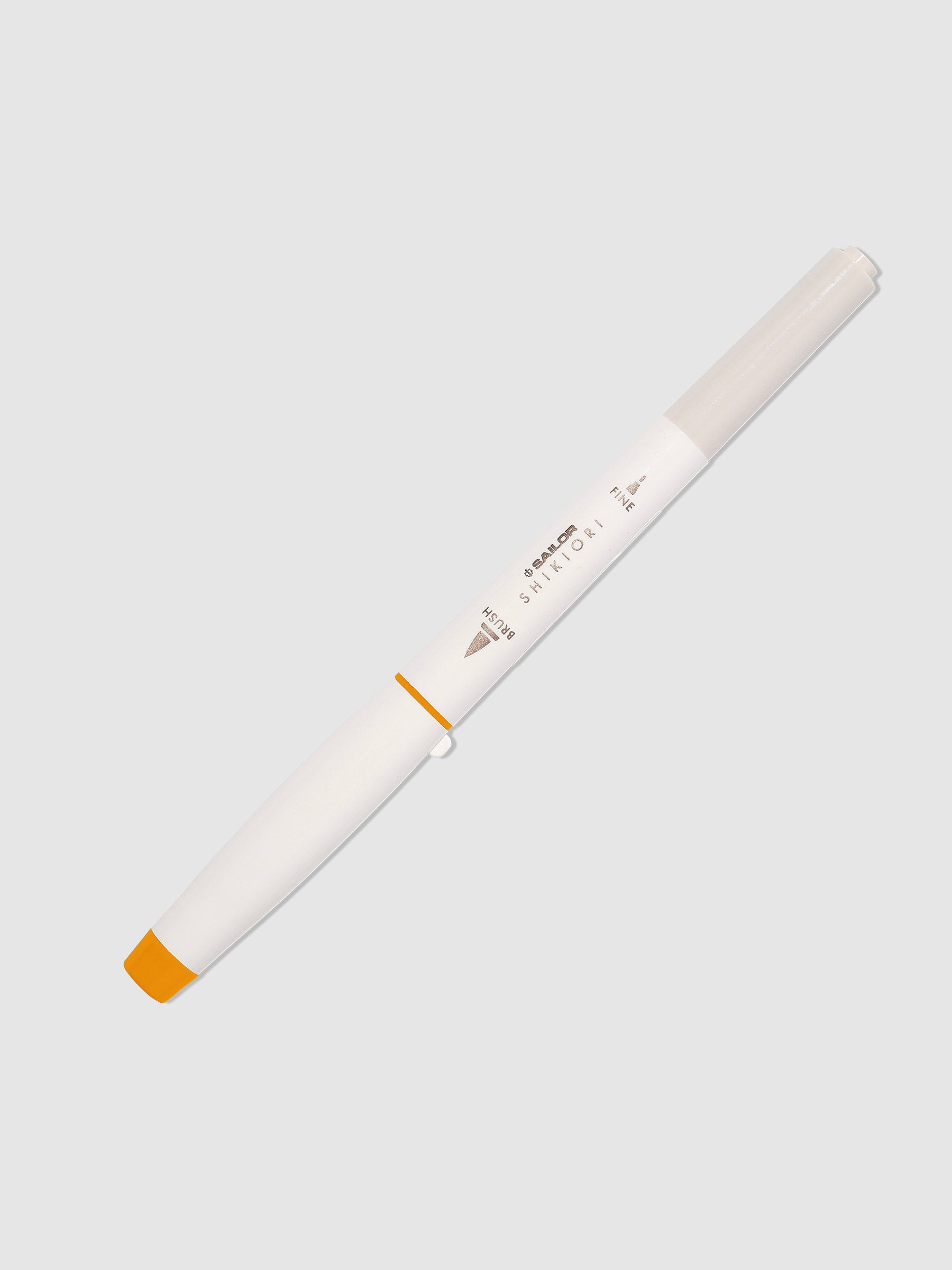 Brush pen displayed on a neutral background. Color pictured is Kinmokusei. 