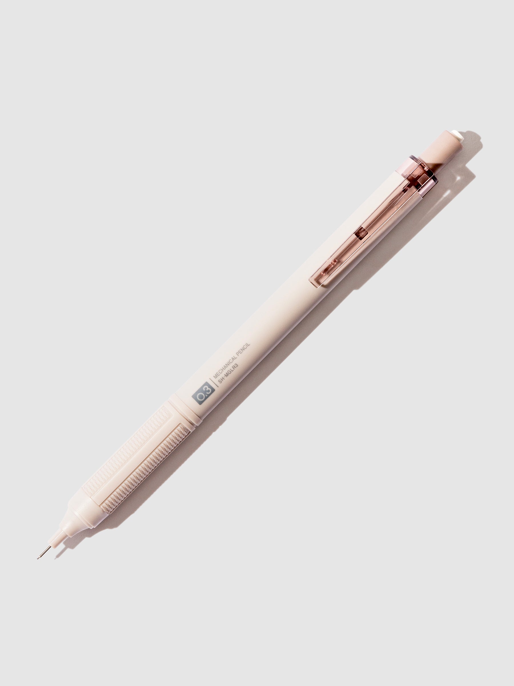Tombow Mono Graph Lite Mechanical Pencil, Cloth and Paper. Greyish brown pencil displayed on a neutral background.
