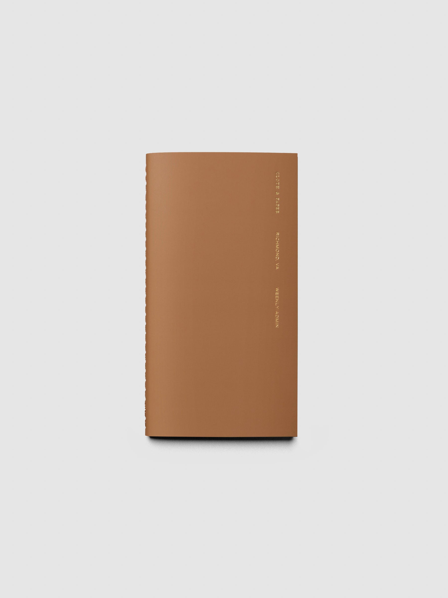 Overview image of the Weekly Admin Pocket Plus notebook from the Traveler's Notebook Collection. The cover has gold foil text that reads Cloth and Paper Richmond, VA Monthly Admin and is displayed on a neutral background