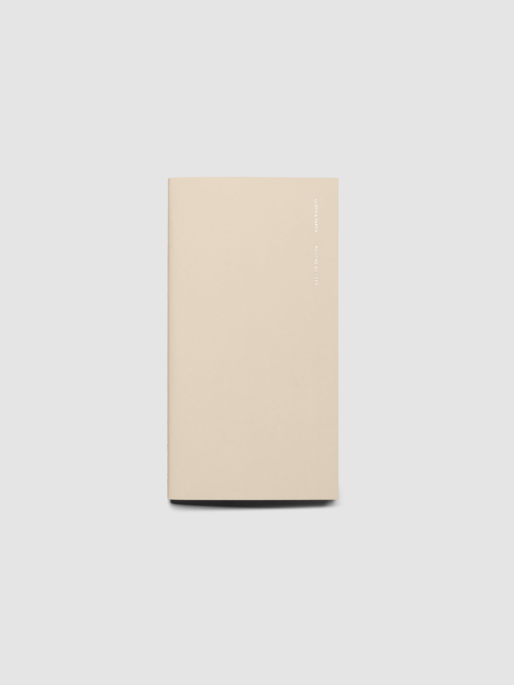 Overview image of the Beignet Monthly Admin Pocket Plus notebook from the Traveler's Notebook Collection. The cover has silver foil text that reads Cloth and Paper Richmond, VA Monthly Admin and is displayed on a light gray background.