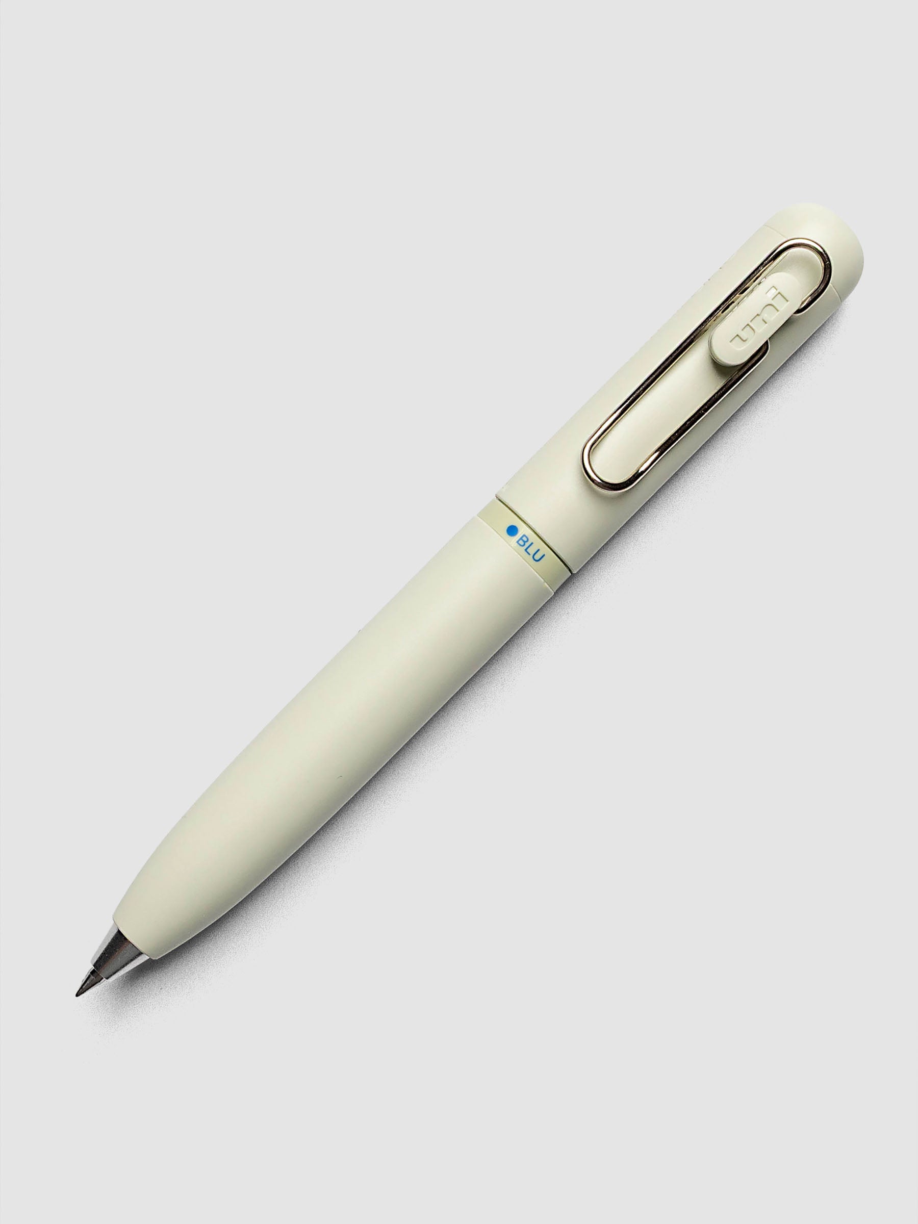 Uni-ball One 3-Color Ballpoint Pen in pale sage green close up of barrel showing BLU color indicator
