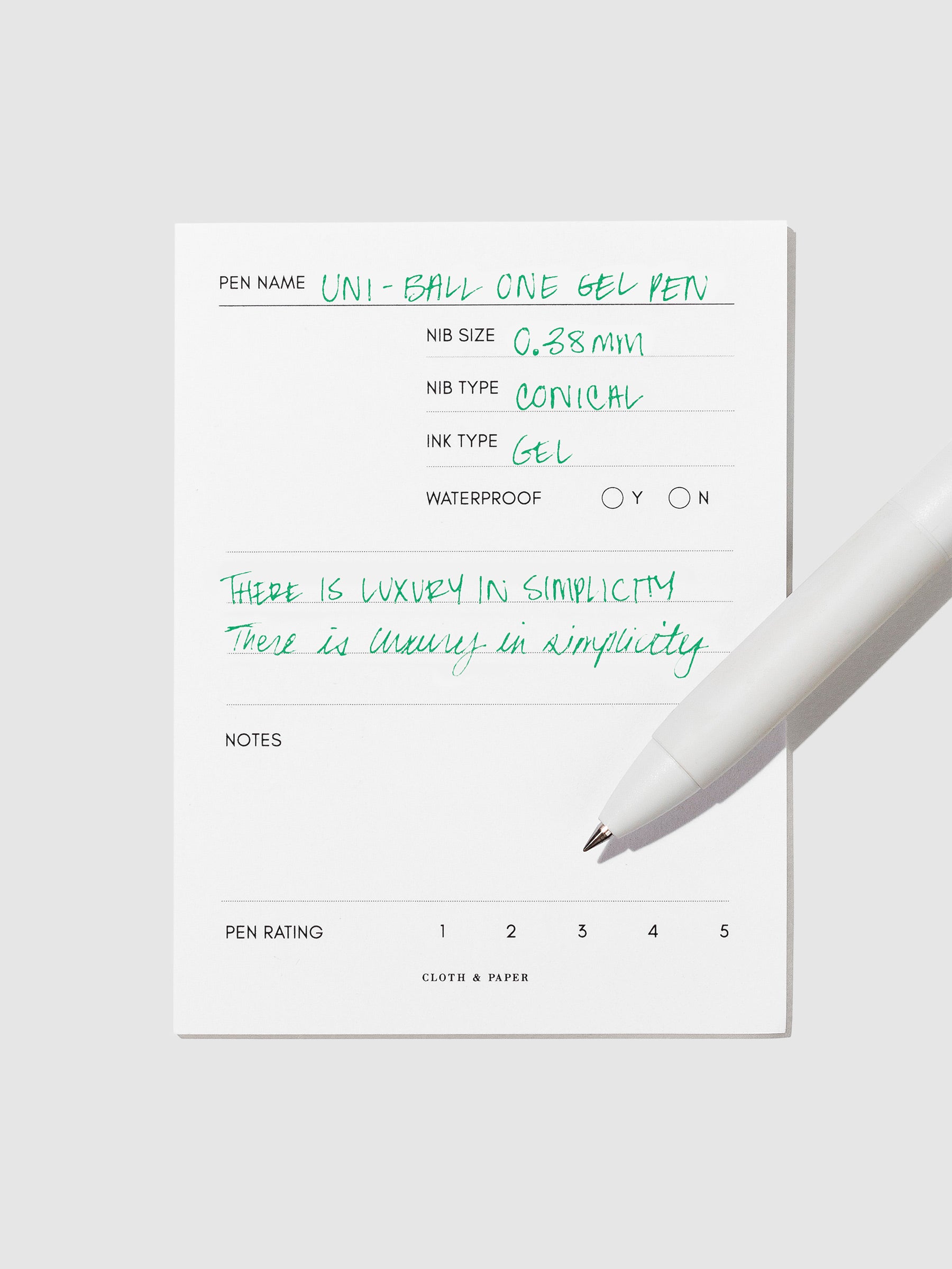 Pen tilted slightly to the right on a neutral background. Color pictured is  Green.