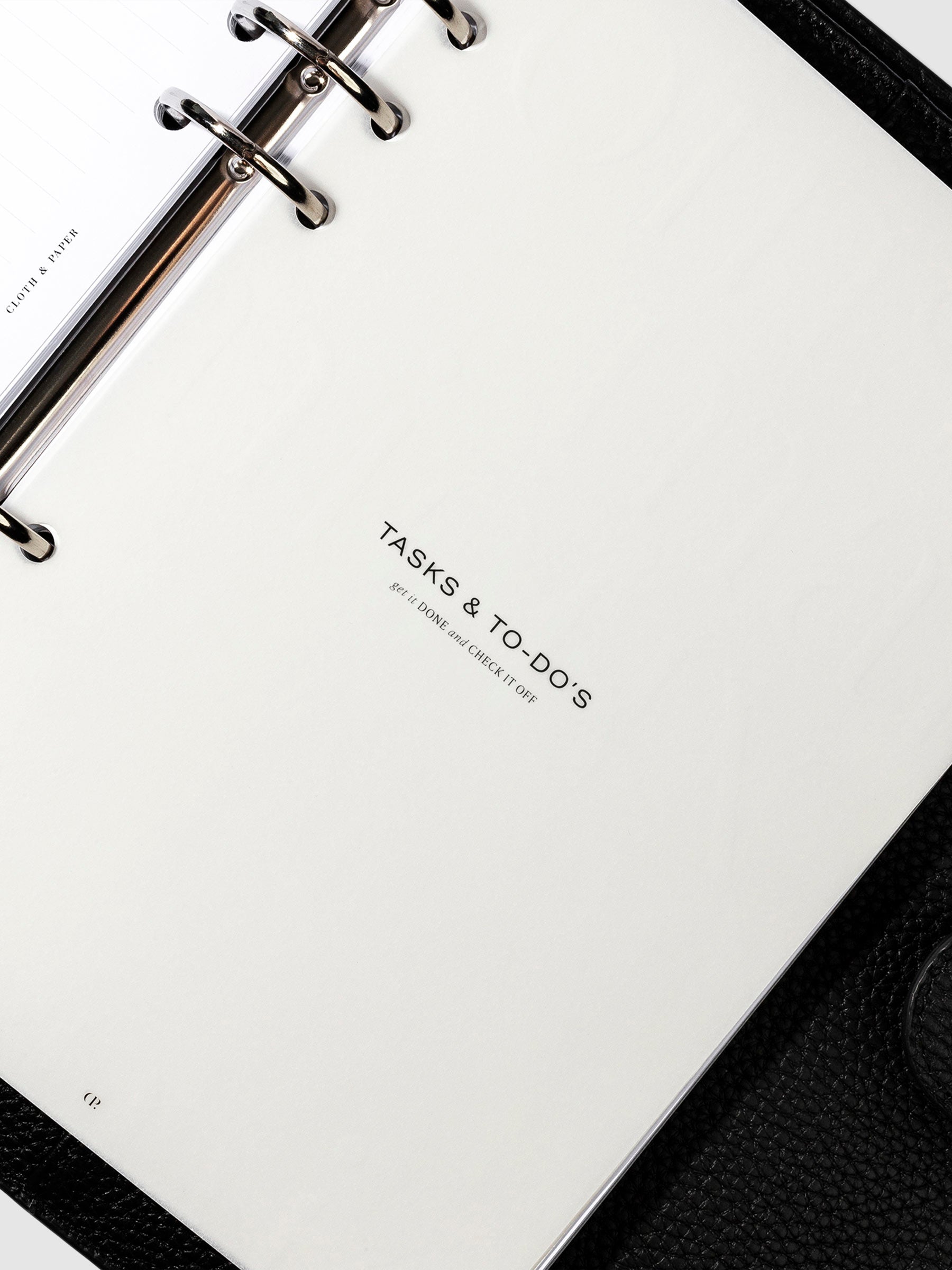 Tasks and To-Do's  dashboard in use inside a leather planner.