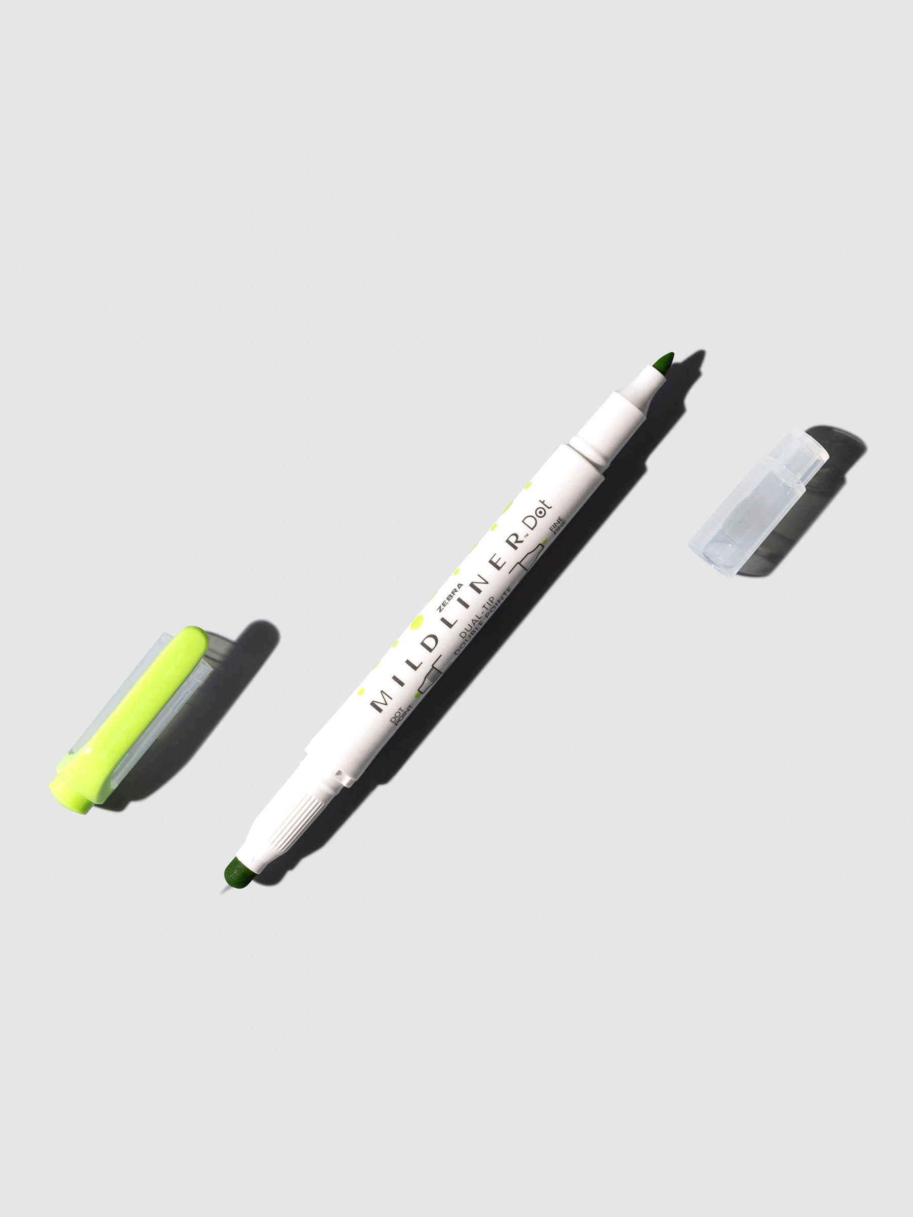 Mildliner highlighter displayed on a neutral background. Color shown is green.